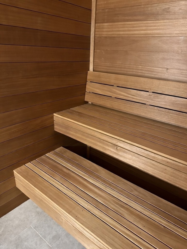 Close up of Ambara sauna benches and wood grain